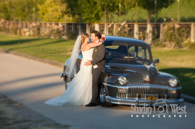 Bride and groom quiet moment with a 1955 De Soto bride and groom with 1955 De Soto