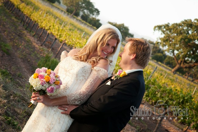 Firestone Winery - Smiling Bride in Winery - studio101west photography Firestone Vineyard - Santa Barbara County Photographer - Central Coast Wedding Venues - studio 101 west