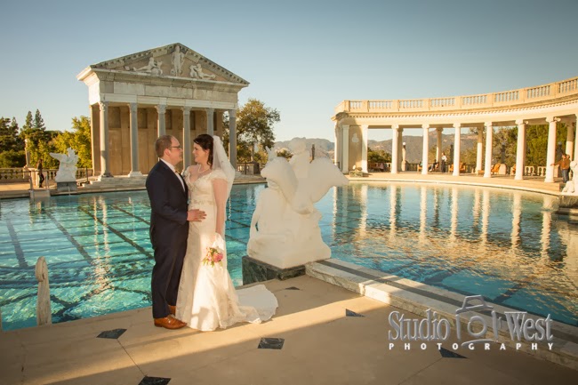 Bride and Groom by the Neptune Pool Studio101West Photography