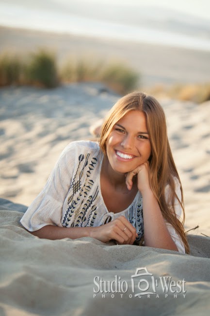 Studio 101 West senior pictures high school senior on sandy beach