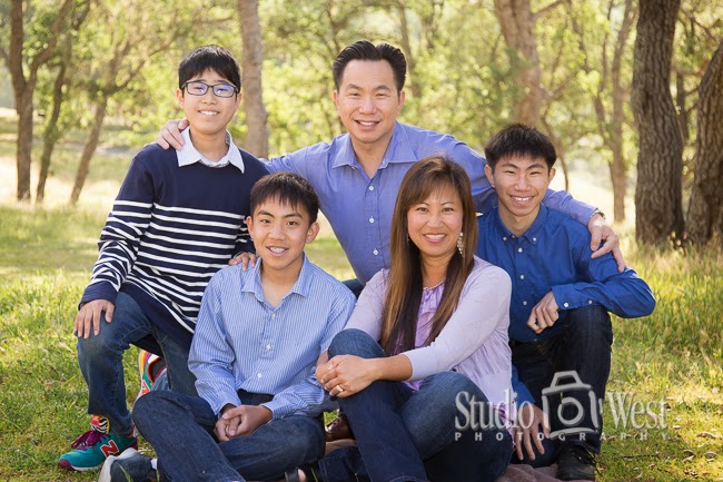 Outdoor family portraitrue Location family portrait - Wooded location shoot - Family portrait - Studio 101 West Photography