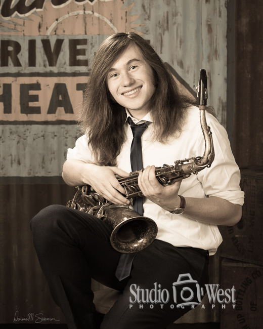 senior portrait of guy with saxophone in studio atascadero senior portrait photographers